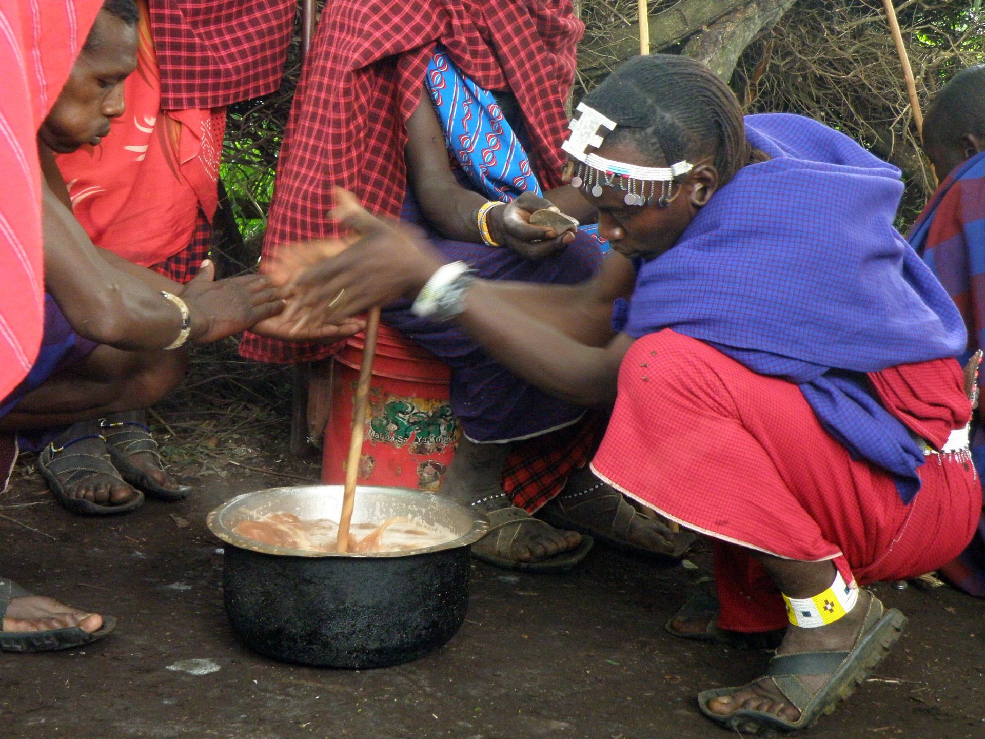 Maasai Warriors Stirring Soup, Olpul Camp,